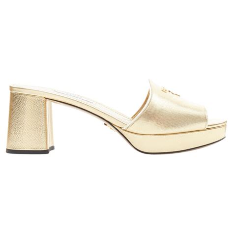 prada gold clogs